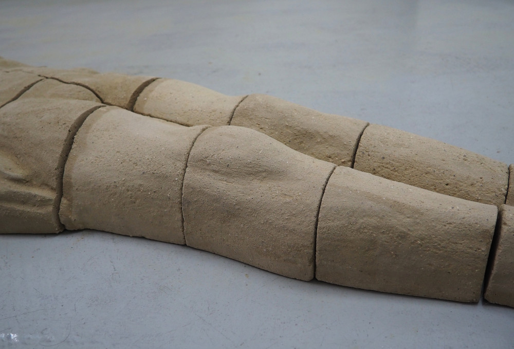 Detalle hombre de barro